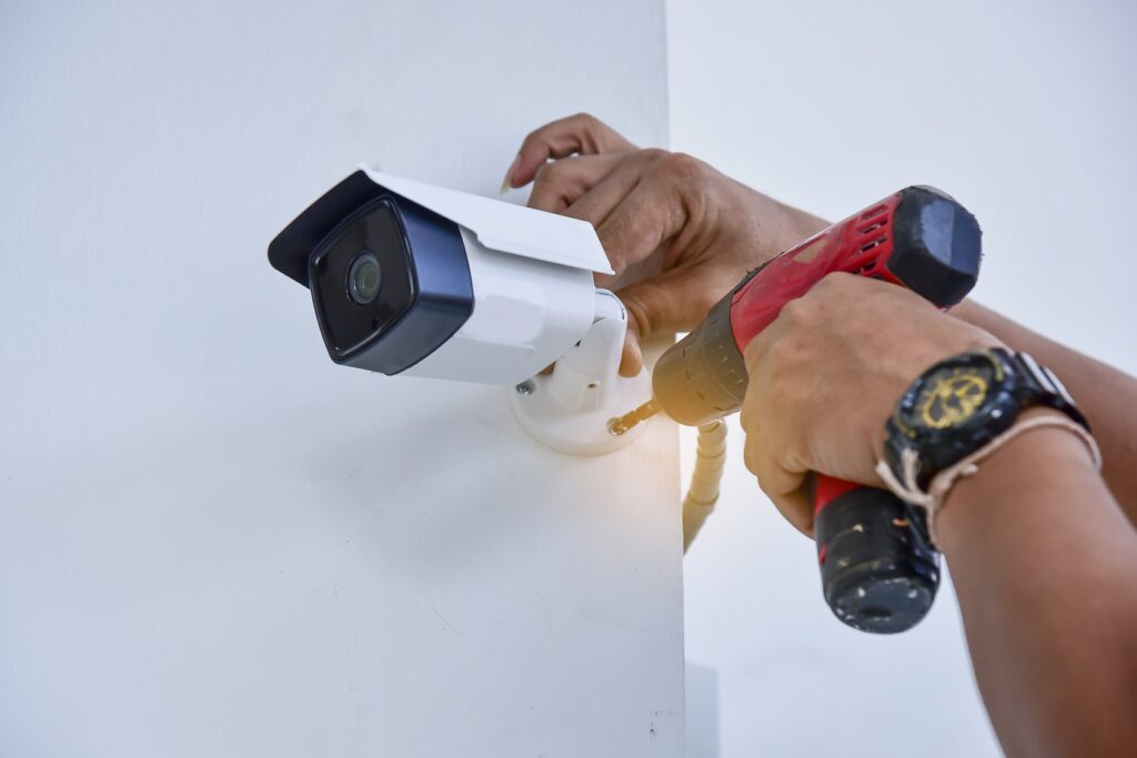 technician,installing,cctv,camera,for,security